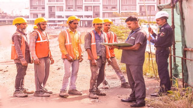 "Construction Site Security Supervisor Ensuring Labor Safety and Registering Entries